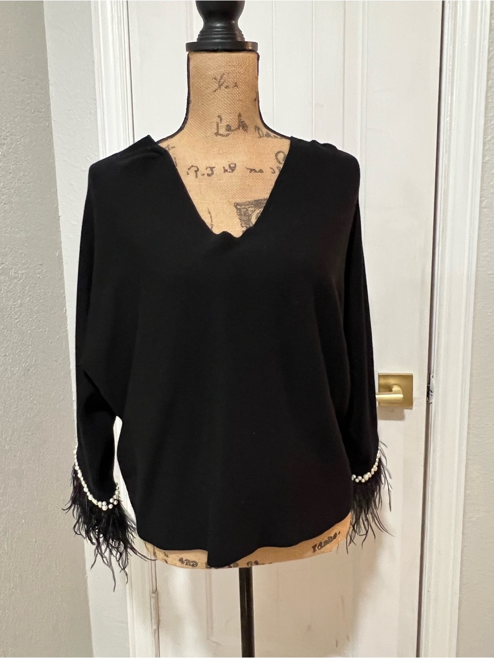 Sioni Black V-Neck Top with Pearl & Feather Sleeve Trim